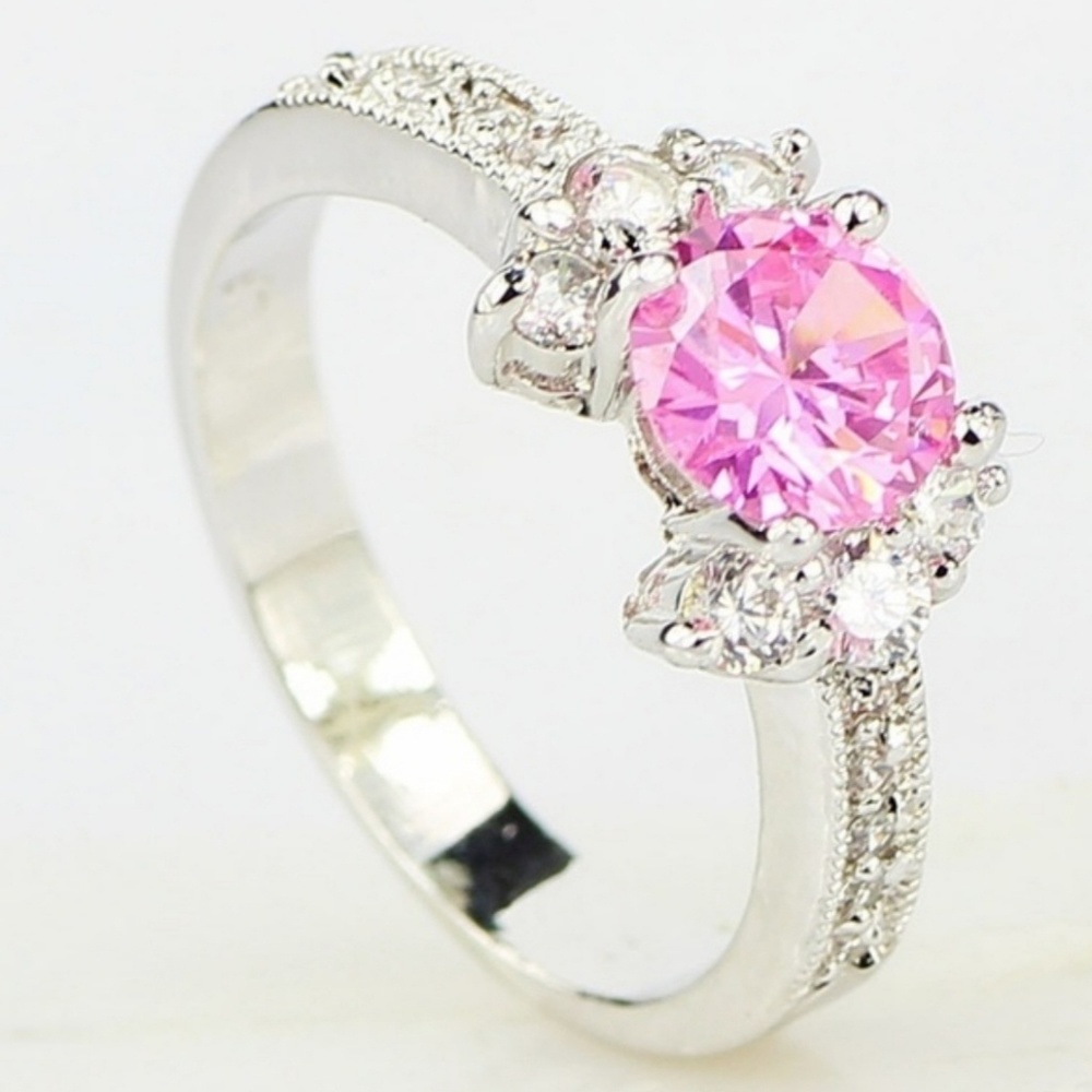 Silvertone ring with pink stone, size 7